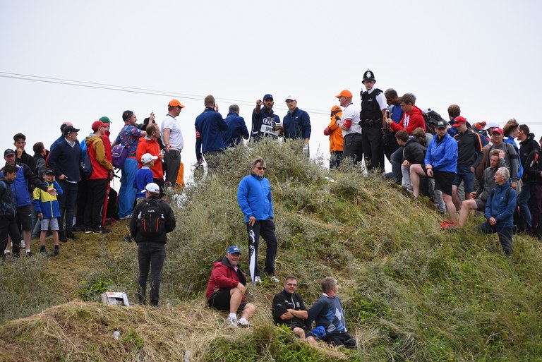 SOUTHPORT, ENGLAND - JULY 23:  Jordan Spieth of the United States and caddie Michael Greller discuss the playing line for his third shot on the 13th hole during the final round of the 146th Open Championship at Royal Birkdale on July 23, 2017 in Southport, England.  (Photo by Richard Heathcote/R&A/R&A via Getty Images)