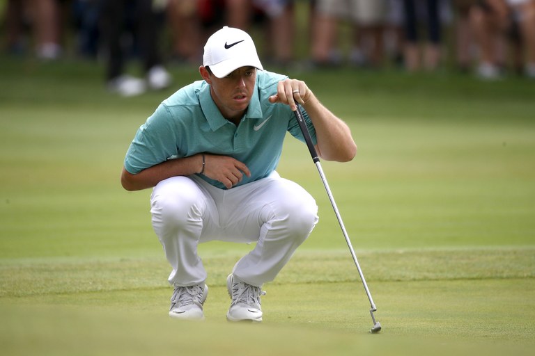 AKRON, OH - AUGUST 06:  Rory McIlroy of Northern Ireland lines up a putt on the eighth green during the final round of the World Golf Championships - Bridgestone Invitational at Firestone Country Club South Course on August 6, 2017 in Akron, Ohio.  (Photo by Gregory Shamus/Getty Images)