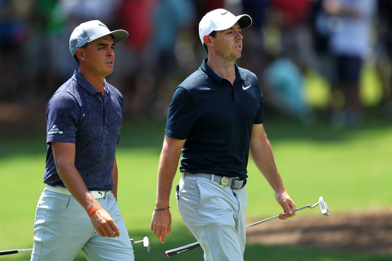 CHARLOTTE, NC - AUGUST 10:  Rickie Fowler of the United States and Rory McIlroy of Northern Ireland walk along the second hole during the first round of the 2017 PGA Championship at Quail Hollow Club on August 10, 2017 in Charlotte, North Carolina.  (Photo by Warren Little/Getty Images)