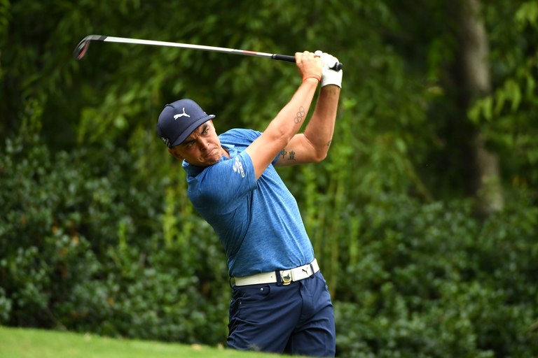 CHARLOTTE, NC - AUGUST 11:  Rickie Fowler of the United States plays his shot from the 12th tee during the second round of the 2017 PGA Championship at Quail Hollow Club on August 11, 2017 in Charlotte, North Carolina.  (Photo by Ross Kinnaird/Getty Images)