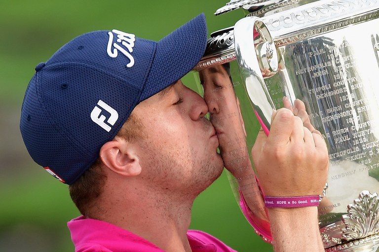 CHARLOTTE, NC - AUGUST 13:  Justin Thomas of the United States poses with the Wanamaker Trophy after winning the 2017 PGA Championship during the final round at Quail Hollow Club on August 13, 2017 in Charlotte, North Carolina. Thomas finished with an -8.  (Photo by Stuart Franklin/Getty Images)