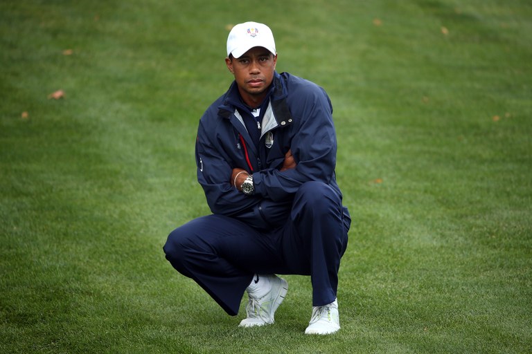 MEDINAH, IL - SEPTEMBER 30:  Tiger Woods of the USA watches from the first fairway during the Singles Matches for The 39th Ryder Cup at Medinah Country Club on September 30, 2012 in Medinah, Illinois.  (Photo by Andrew Redington/Getty Images)