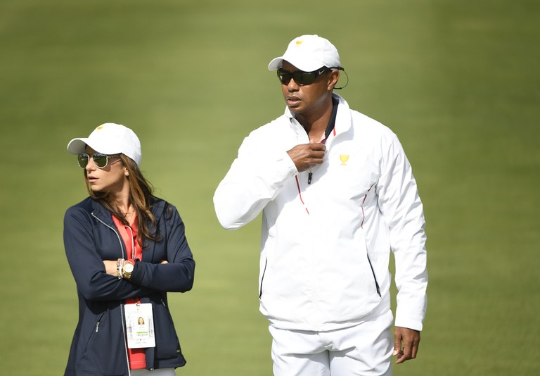 JERSEY CITY, NJ - SEPTEMBER 29: Tiger Woods, Captains Assistant of the U.S. Team,  and girlfriend Erica Herman on the course during the second round of the Presidents Cup at Liberty National Golf Club on September 29, 2017, in Jersey City, New Jersey. (Photo by Chris Condon/PGA TOUR)