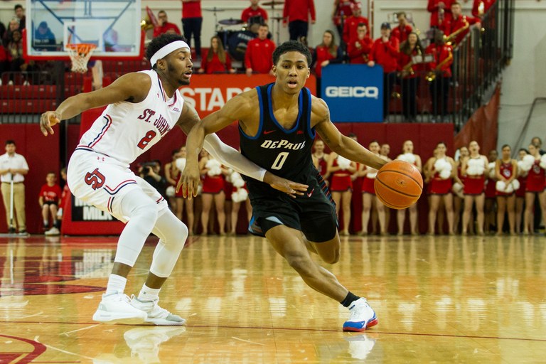 QUEENS, NY - JANUARY 06: DePaul's Guard Justin Roberts #0 gets around St. John's Guard Shamorie Ponds #2 during the first half of a men's BigEast conference basketball game between the DePaul Blue Demon's and the St. John's Red Storm on January 06, 2018, at Carnesecca Arena in Queens, NY. (Photo by David Hahn/Icon Sportswire via Getty Images)