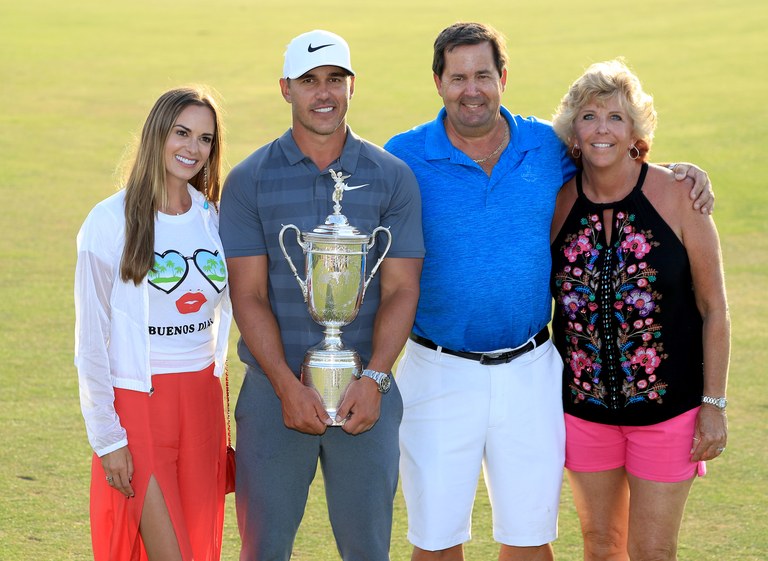 Brooks Koepka with his father Bob Koepka, girlfriend Jena Sims and mother Denise Jakows after winning the 2018 U.S. Open.