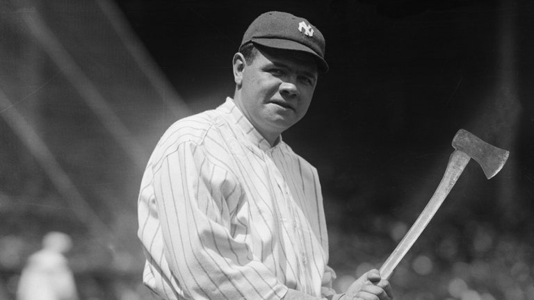 Baseball Player Babe Ruth Holding Bat